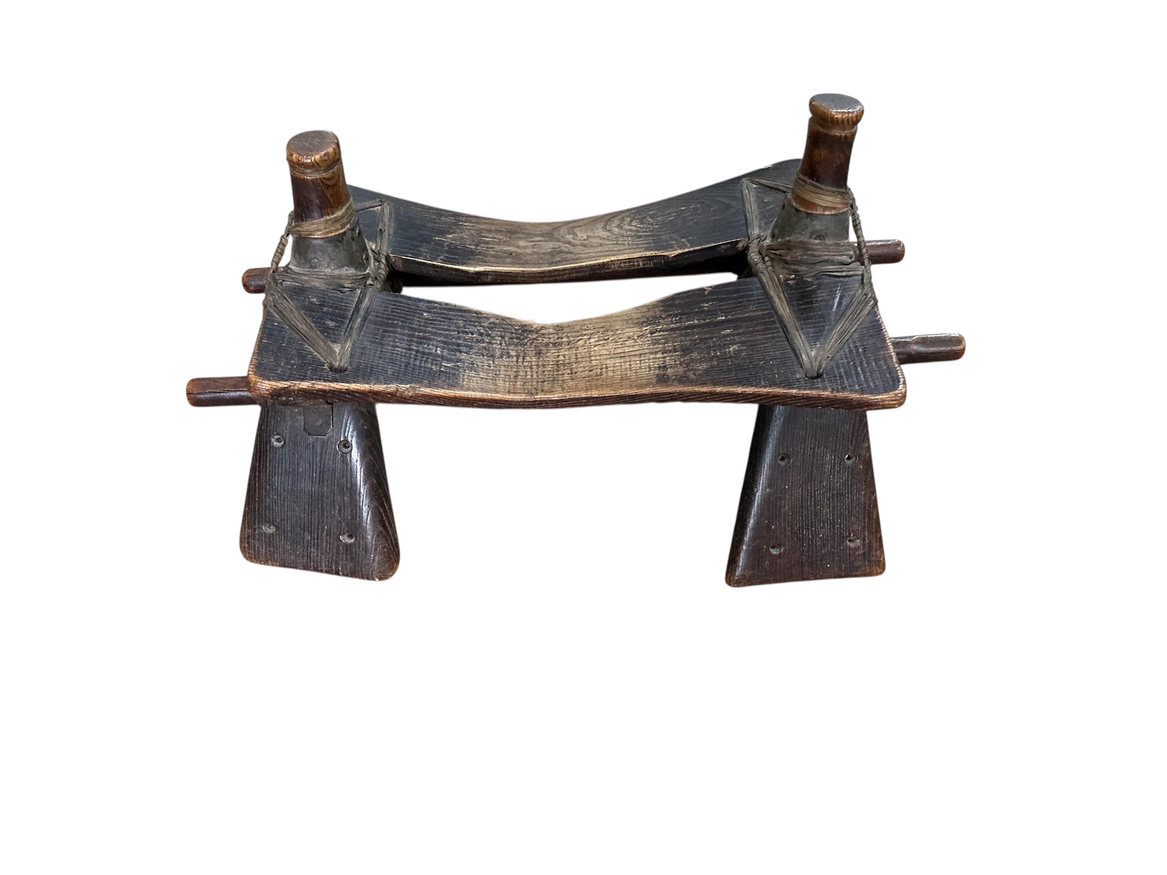 A camel's saddle, width 78cm, depth 49cm, height 46cm